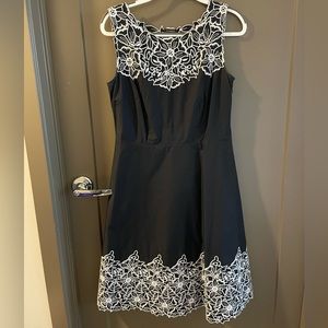 Embroidered dress with peekaboo lace collar